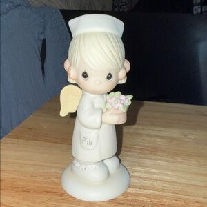 Precious Moments 1986 “Angel of Mercy” Figurine with Flowers